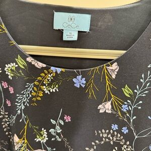 CeCe Black Top with Vibrant Floral Design